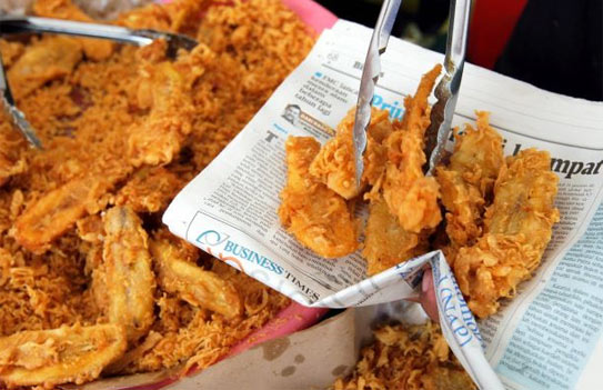 Cảnh báo nhiễm độc chì do ăn thực phẩm gói bằng giấy báo