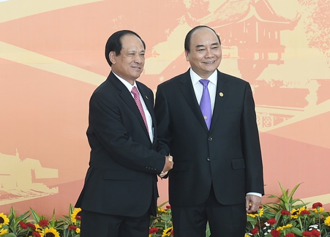 Thủ tướng Nguyễn Xuân Phúc đón Tổng Thư ký ASEAN Lê Lương Minh. Ảnh: VGP/Quang Hiếu.