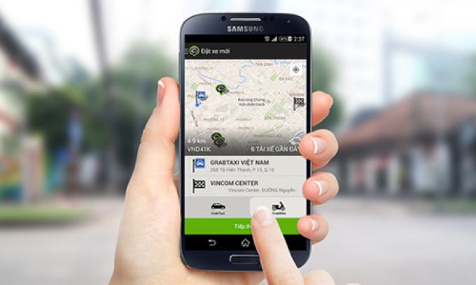 Taxi truyền thống đòi tăng thuế với Grab, Uber
