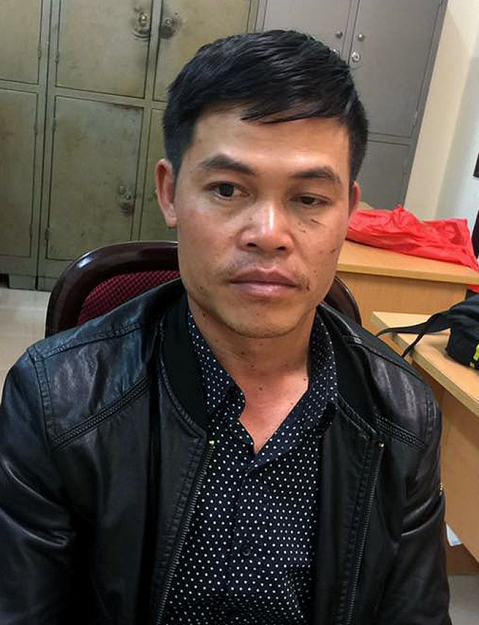 Quang tại cơ quan công an.