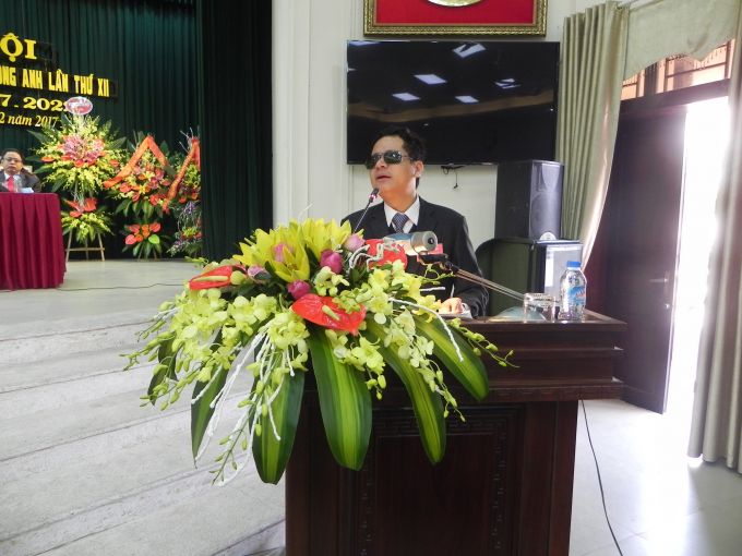 Ảnh 1: &Ocirc;ng Ho&agrave;ng Mạnh Cường &ndash; Chủ tịch Hội người m&ugrave; huyện Đ&ocirc;ng Anh ph&aacute;t biểu tại đại hội